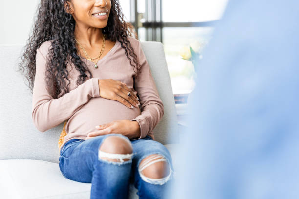 istock Pregnant woman talks with potential adoptive mother 2183759255