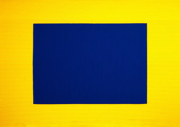 Yellow and blue corrugated paper background suitable for cards