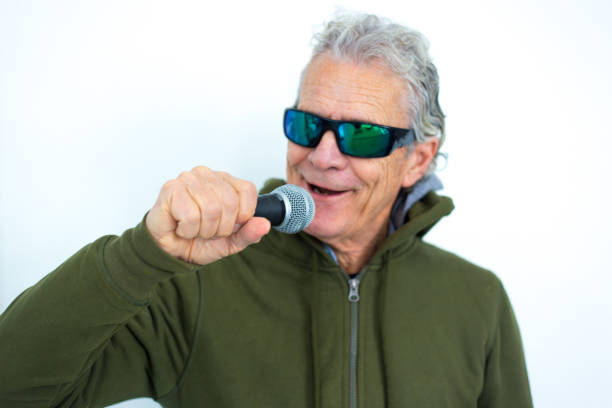 Senior Man with Microphone, Sunglasses, Singing, Speaking