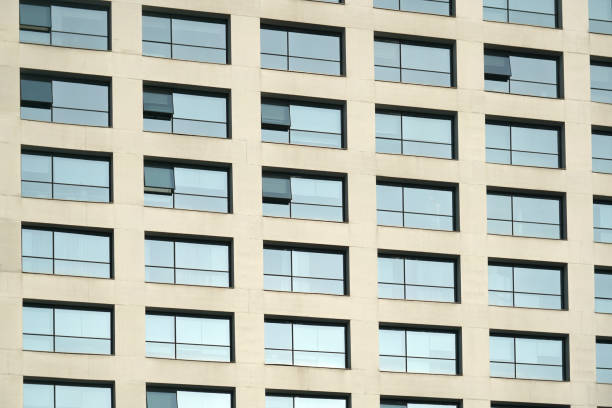 istock close up on windows and wall of modern office building 2183765695