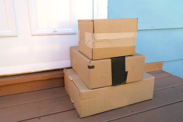 Close-up on a delivery package on the floor - online shopping concepts