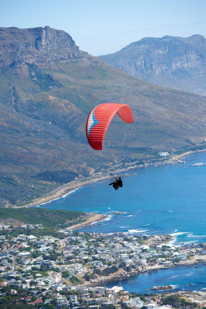 istock Paraglider soaring in the sky 2183768526