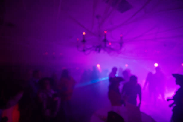 istock Blurred Costume Party At Night with People Dancing 2183792418