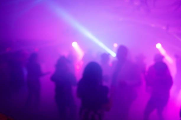 istock Blurred Costume Party At Night with People Dancing 2183792430
