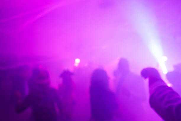 istock Blurred Costume Party At Night with People Dancing 2183792431