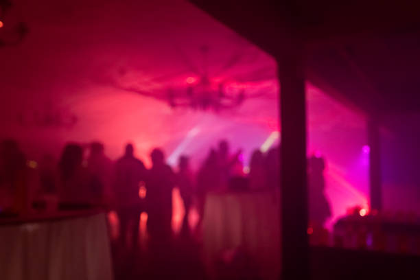istock Blurred Costume Party At Night with People Dancing 2183792442