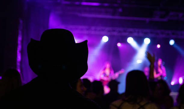 istock Crowd enjoying a life music performance concert rock 2183796465