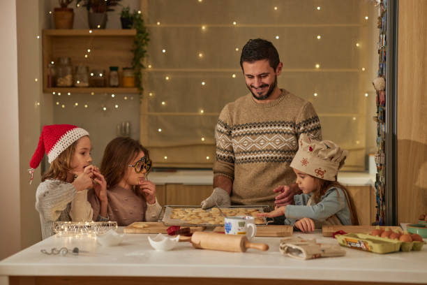 istock Beautiful family making Christmas cookies 2183798978