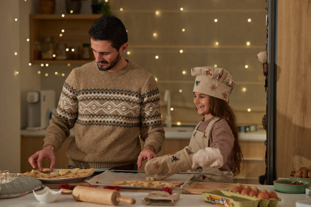 istock Beautiful family making Christmas cookies 2183799121