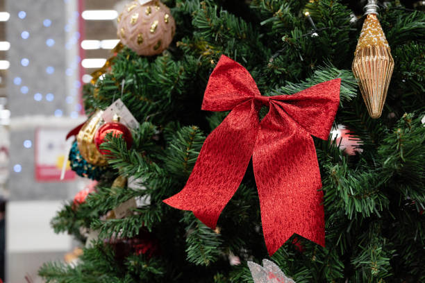 istock Christmas tree decorations featuring a red bow and ornaments. 2183804878