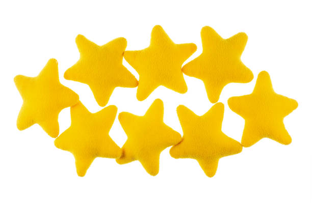 istock soft toys yellow stars isolated on white background 2183806613