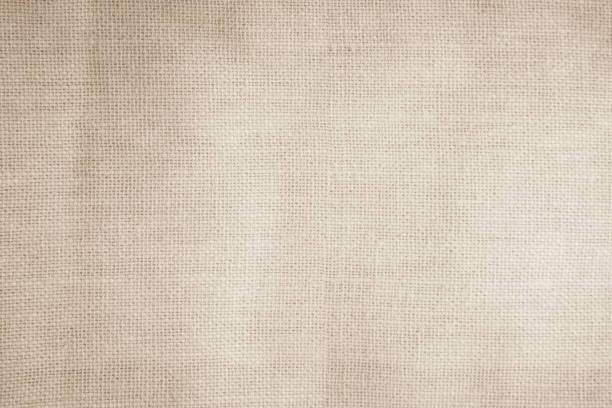 istock Brown sackcloth woven texture background in natural pattern. Jute hessian burlap, linen background in light beige cream color blank. Weaving canvas fiber line cotton cloth textured as organic. 2183812004