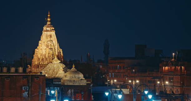 Jaipur, Rajasthan, India. Sita Ram Ji Ka Temple In Night Illumination. Temple Is Situated In Chhoti Chaupar Bazar. Sikhara Has Multiple Turrets Called Anga Sikharas. Sikhara Is Surmounted By Large Amalaka And Beautiful Water Vase Type Pinnacle. jaipur, rajasthan, india. sita ram ji ka temple in night illumination. temple is situated in chhoti chaupar bazar. sikhara has multiple turrets called anga sikharas. sikhara is surmounted by large amalaka and beautiful water vase type pinnacle