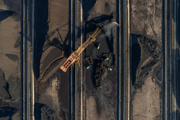 Coal mining in surface mine. Huge bucket excavator during mining.\