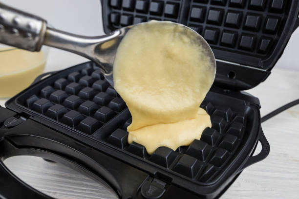 istock Modern waffle maker with ingredients, homemade Belgian waffles. 2183820238
