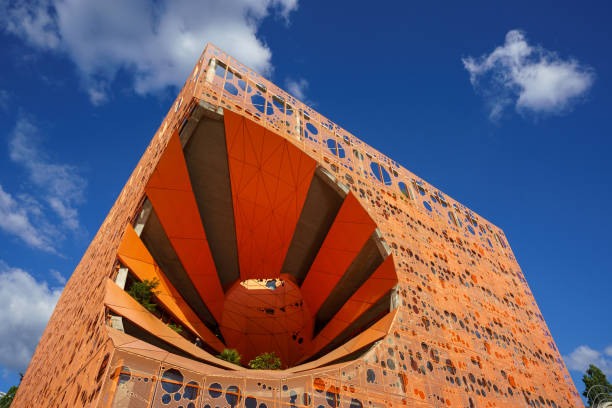 Lyon, France. June 12, 2024. The exterior of the Orange Cube, a modern and famous building located in the Confluence district inaugurated in 2010 and designed by Jakob & MacFarlane