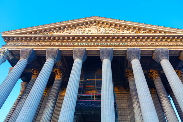 Madeleine Church in Paris France. Grand building featuring tall columns showcasing classic architectural design