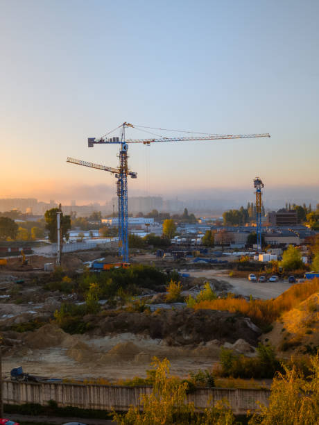 istock Building Site with Cranes in Autumn Mist 2183830743