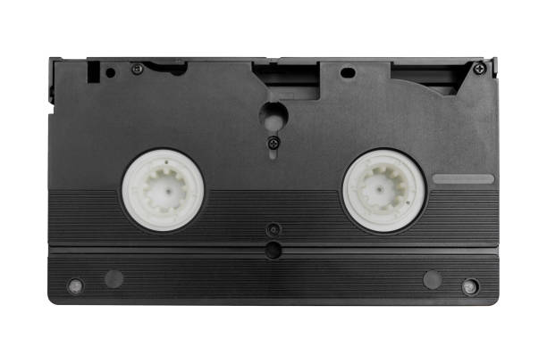 two yellow green VHS video cassettes, top view, close-up, isolated on white background