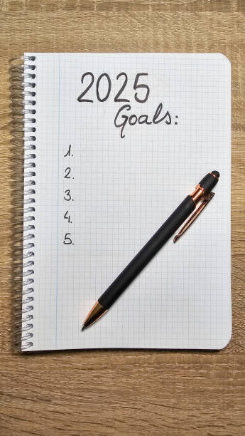 istock Notebook with copy space on the new year 2025 for personal goals 2183837155