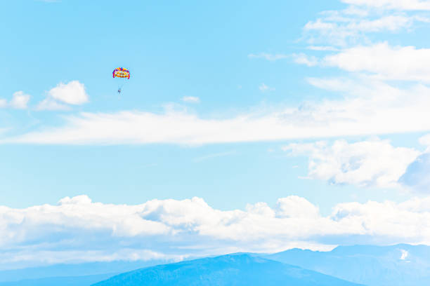 Parachute sport activity for tourists on a tropical travel destination, Maldives