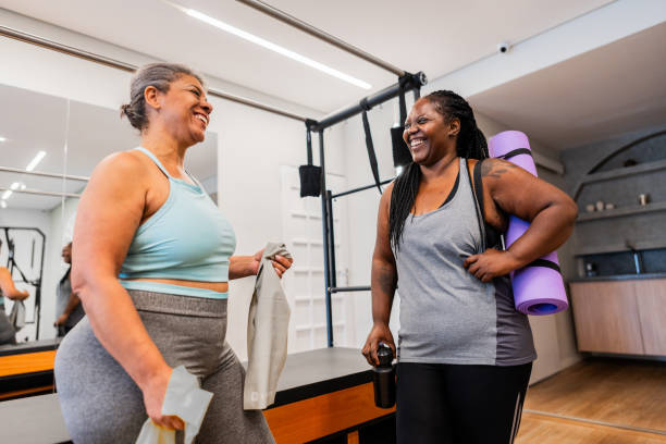 istock Mature friends talking at a pilates studio 2183838968