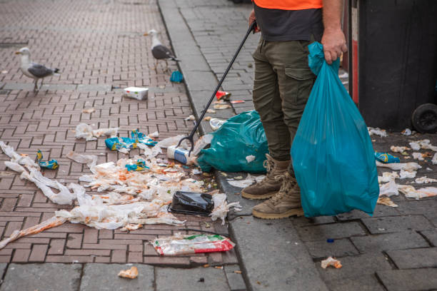 istock Senior environmentalist city worker cleaning up Amsterdam 2183846091
