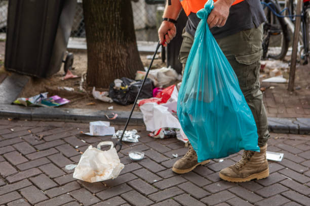 istock Senior environmentalist city worker cleaning up Amsterdam 2183846310