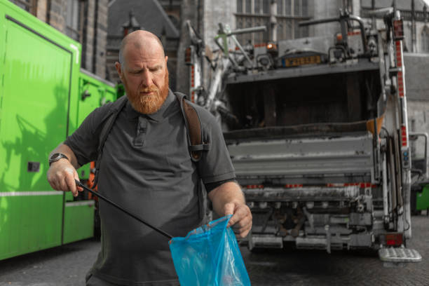 Senior environmentalist volunteer cleaning up Amsterdam