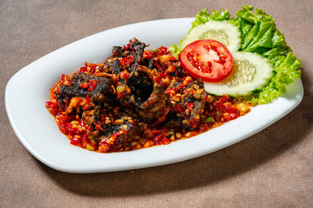 istock Fried eel or belut goreng with sambal balado 2183847116
