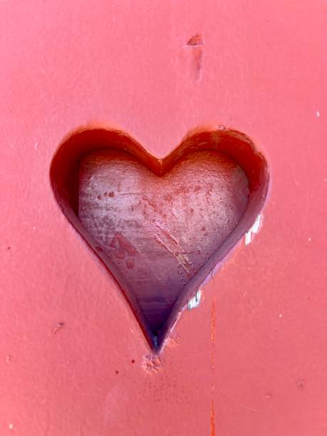 istock heart cut into wooden door 2183849456