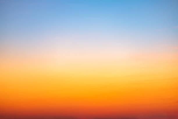 istock Beautiful , luxury soft gradient orange gold clouds and sunlight on the blue sky perfect for the background, take in everning,Twilight, Large size, high definition landscape photo 2183851273