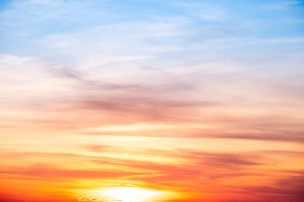 istock Beautiful , luxury soft gradient orange gold clouds and sunlight on the blue sky perfect for the background, take in everning,Twilight, Large size, high definition landscape photo 2183851288