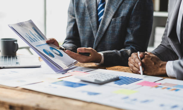 istock Businessman collaboration discussing working analyzing with financial data and marketing growth report graph, presentation and brainstorming to strategy planning making profit of company. 2183855639