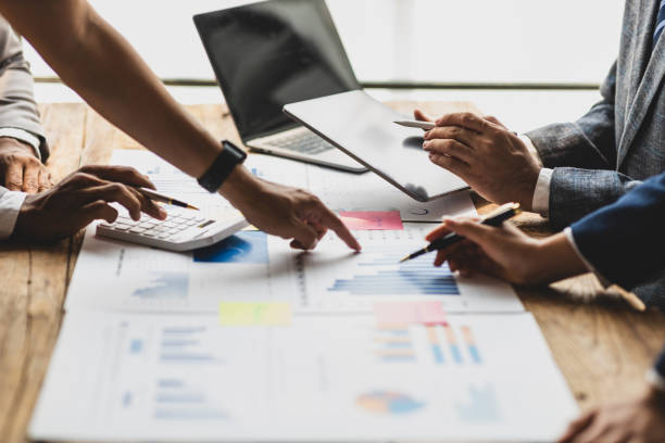 istock Businessman collaboration discussing working analyzing with financial data and marketing growth report graph, presentation and brainstorming to strategy planning making profit of company. 2183855647