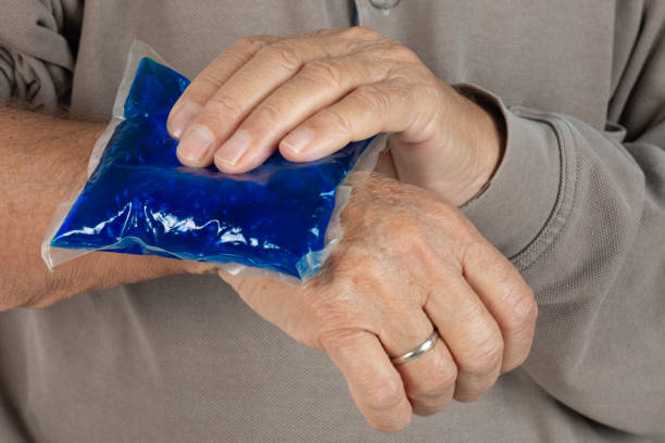 istock Elderly Hand with Cold Compress for Pain Relief 2183857013