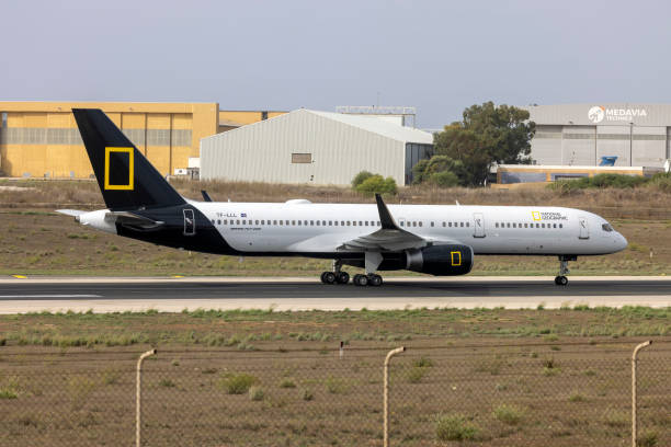 Luqa, Malta - October 22, 2024: National Geographic (Icelandair) Boeing 757-256 (Reg.: TF-LLL) repositioning to apron 8 South to board passengers.