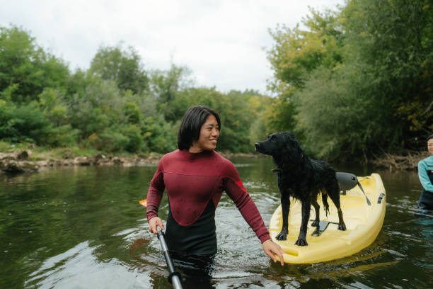 istock Kayaking on the river with our dog 2183859445