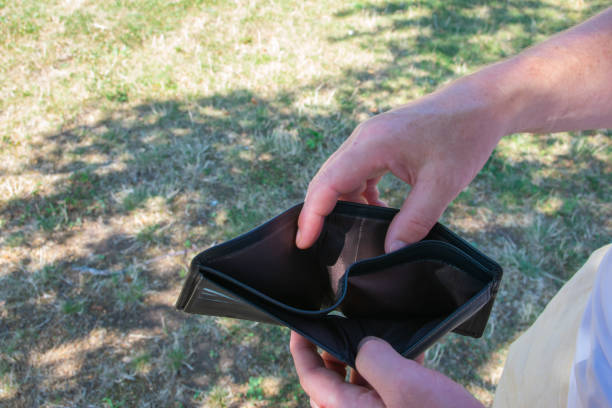 istock Empty leather partmone for money in the hands. Business concept. 2183868527