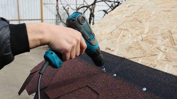 istock fixing soft tiles with a corded screwdriver 2183875691