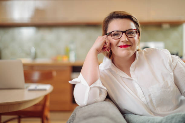 istock Young woman at home 2183877472