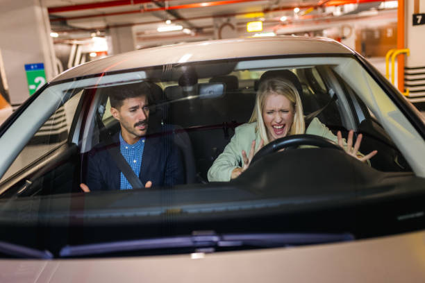 istock Couple having problems, they argue and yell in the car. 2183877531