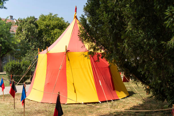 istock Red yellow antique medieval tent in a park 2183877579