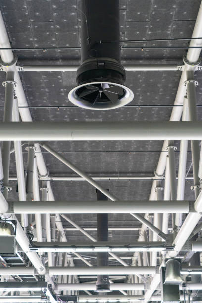 istock Room air conditioner gray ceiling round ventilation pipe with fan blades 2183877585