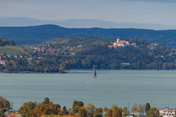 istock lake view with monastery and autumn trees 2183877660
