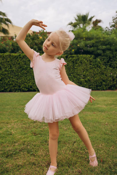 istock Graceful Ballerina Striking a Pose Outdoors 2183878935