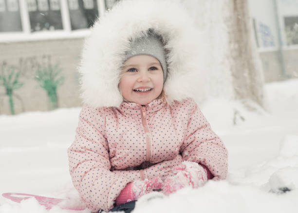 Little girl in winter outdoor