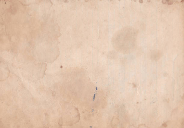 Stained Old Paper Texture Background. Brown vintage paper sheet with space for text