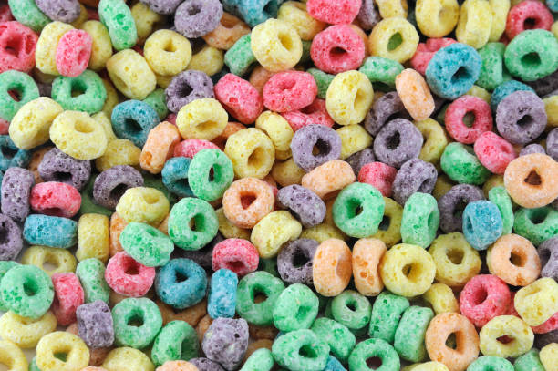 istock Colorful cereal loop rings, breakfast food background 2183881243