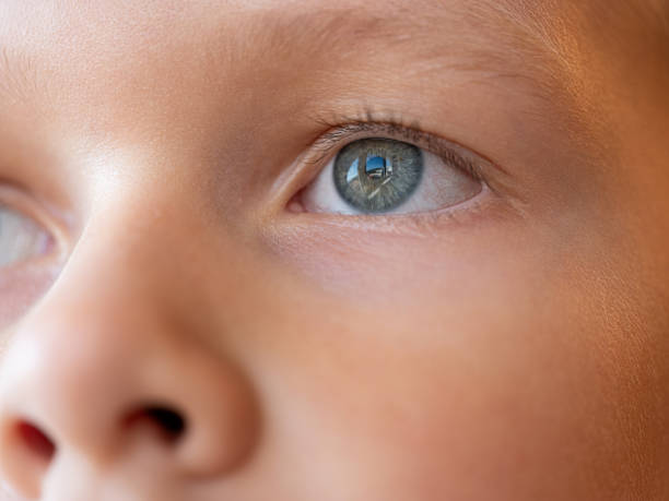 istock Close-up of a Child’s Eye in Soft Light 2183882143